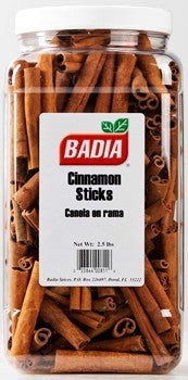 Bodega Badia whole cassia cinnamon sticks in a clear plastic jar, 2.5 lb. Tightly rolled quills with a warm brown color.