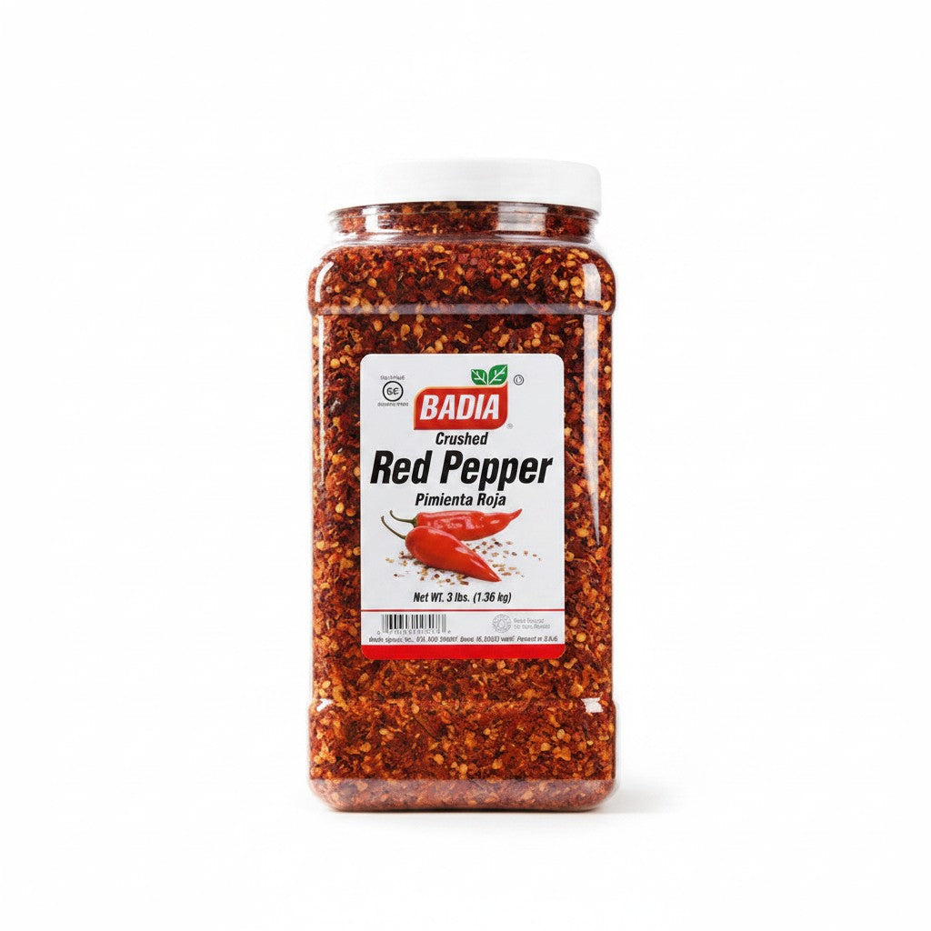 Bodega Badia Crushed Red Pepper Spice in a 3 lb clear plastic container with a white lid. Coarse flakes with seeds visible.