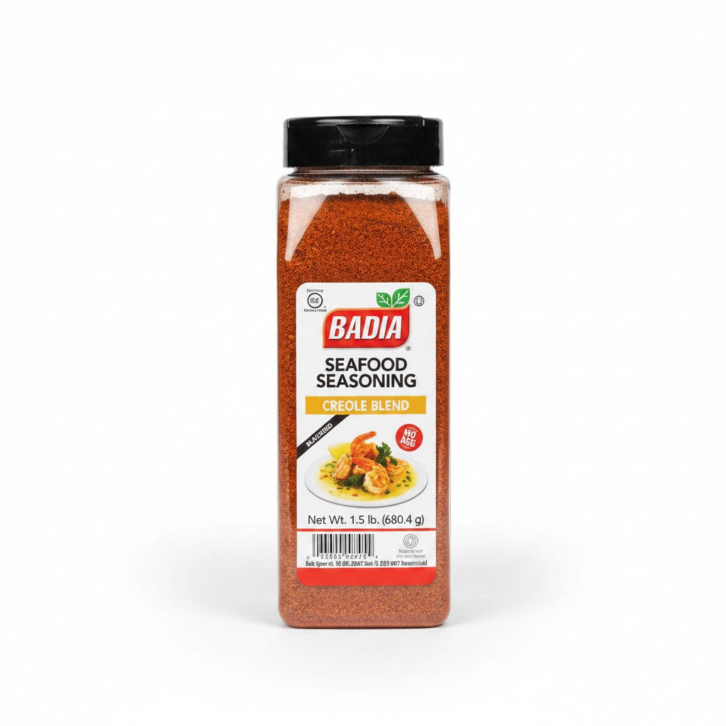 Bodega Badia Seafood Seasoning Creole Blend in a 1.5 lb clear plastic bottle with a black lid. The label features a picture of shrimp.